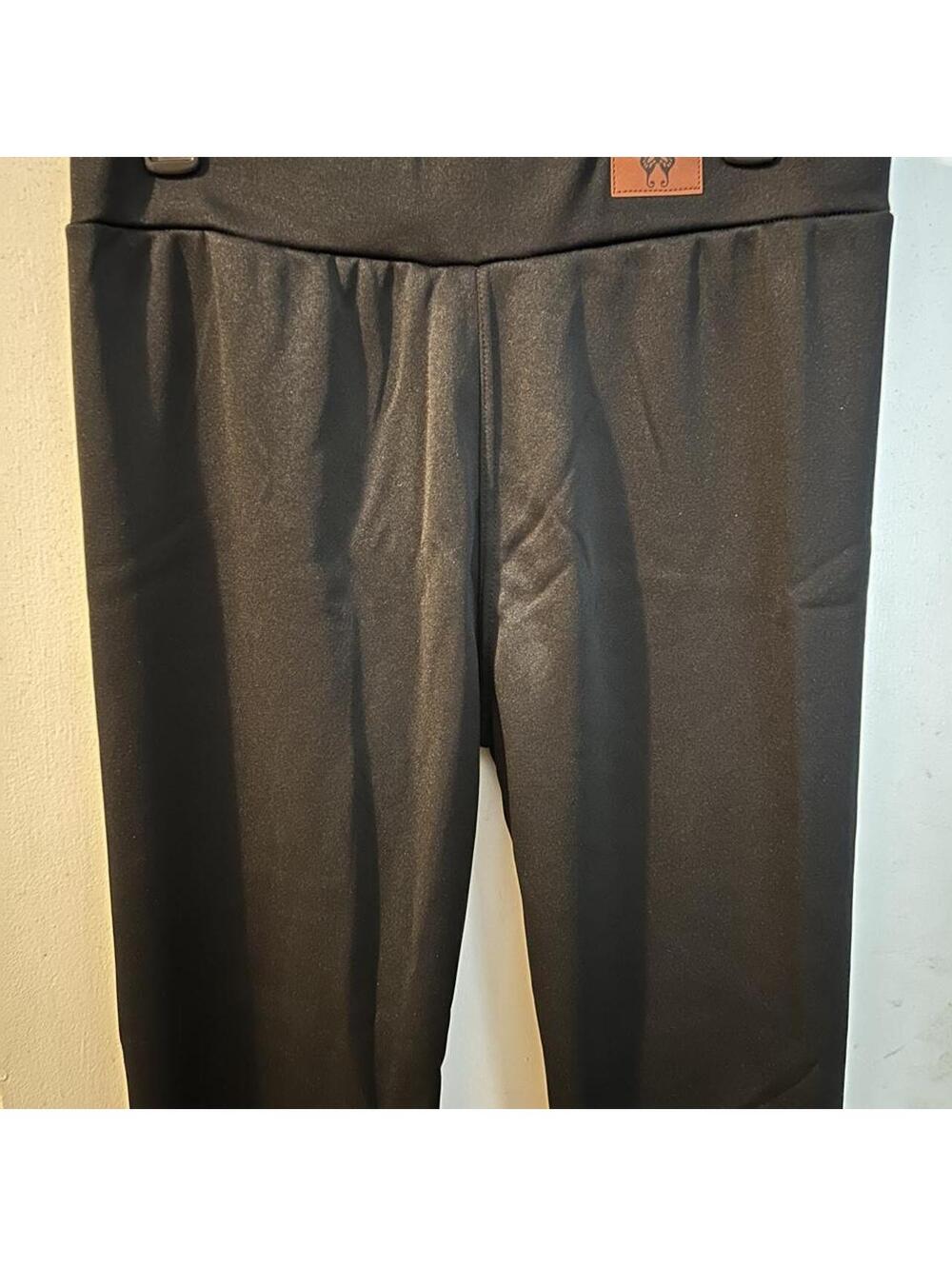 Black fleece lined leggings with a high waist and a stretchy fit size 8
